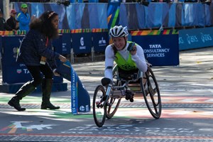 Wheel chair athlete finishing the 2016 TCS New York City Marathon