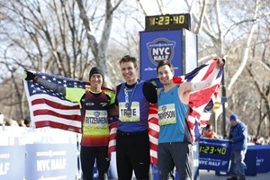 Dathan Ritzenhein, Ben True, and Chris Thompson at the finish line of the 2018 NYRR United Airlines New York City Half Marathon