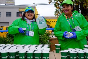 Volunteers setting up Poland Spring water at the TCS New York City Marathon