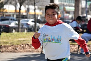 Boy running in NYRR Open Run