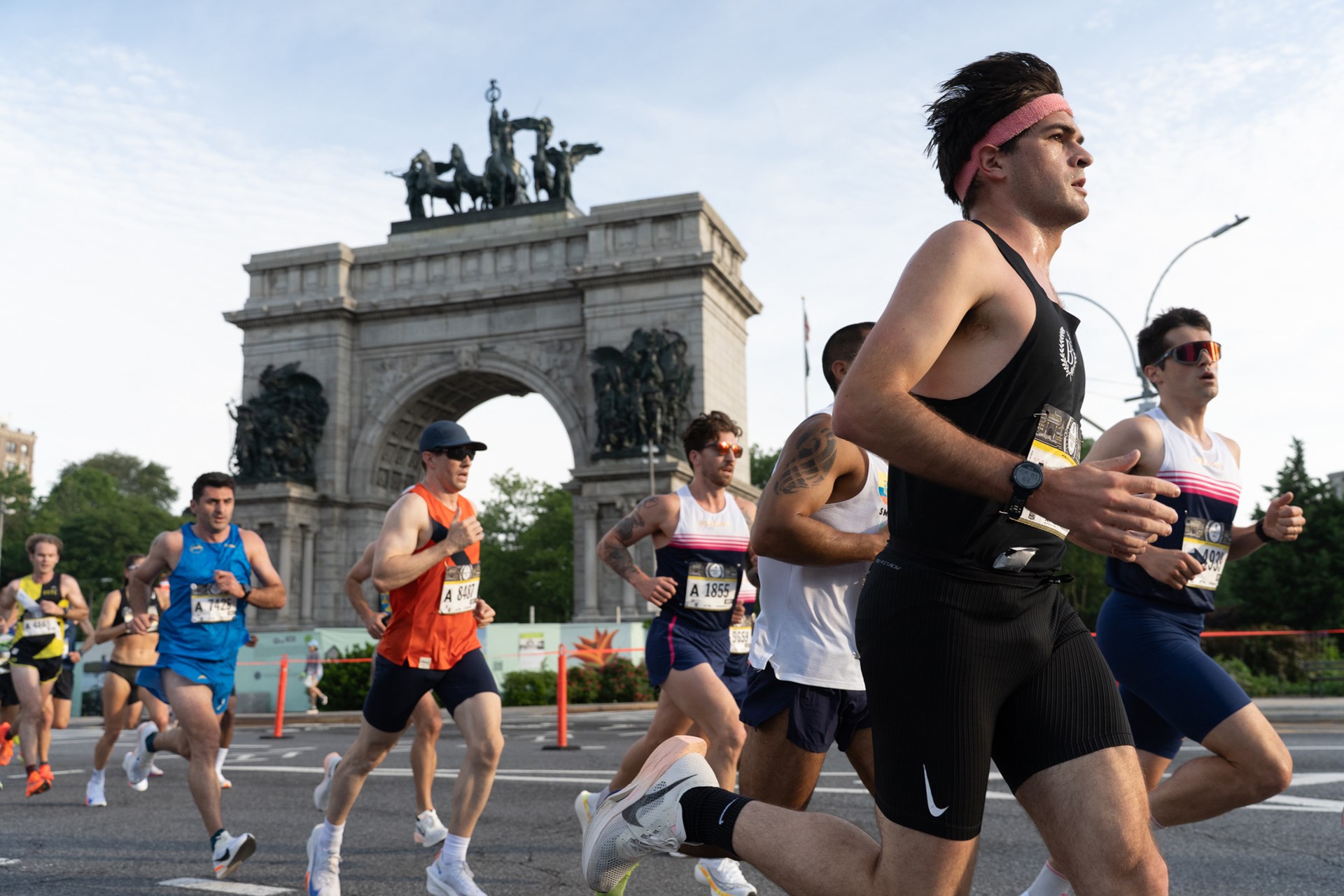 Runners run by Grand Army Plaza in Brooklyn during the RBC Brooklyn Half