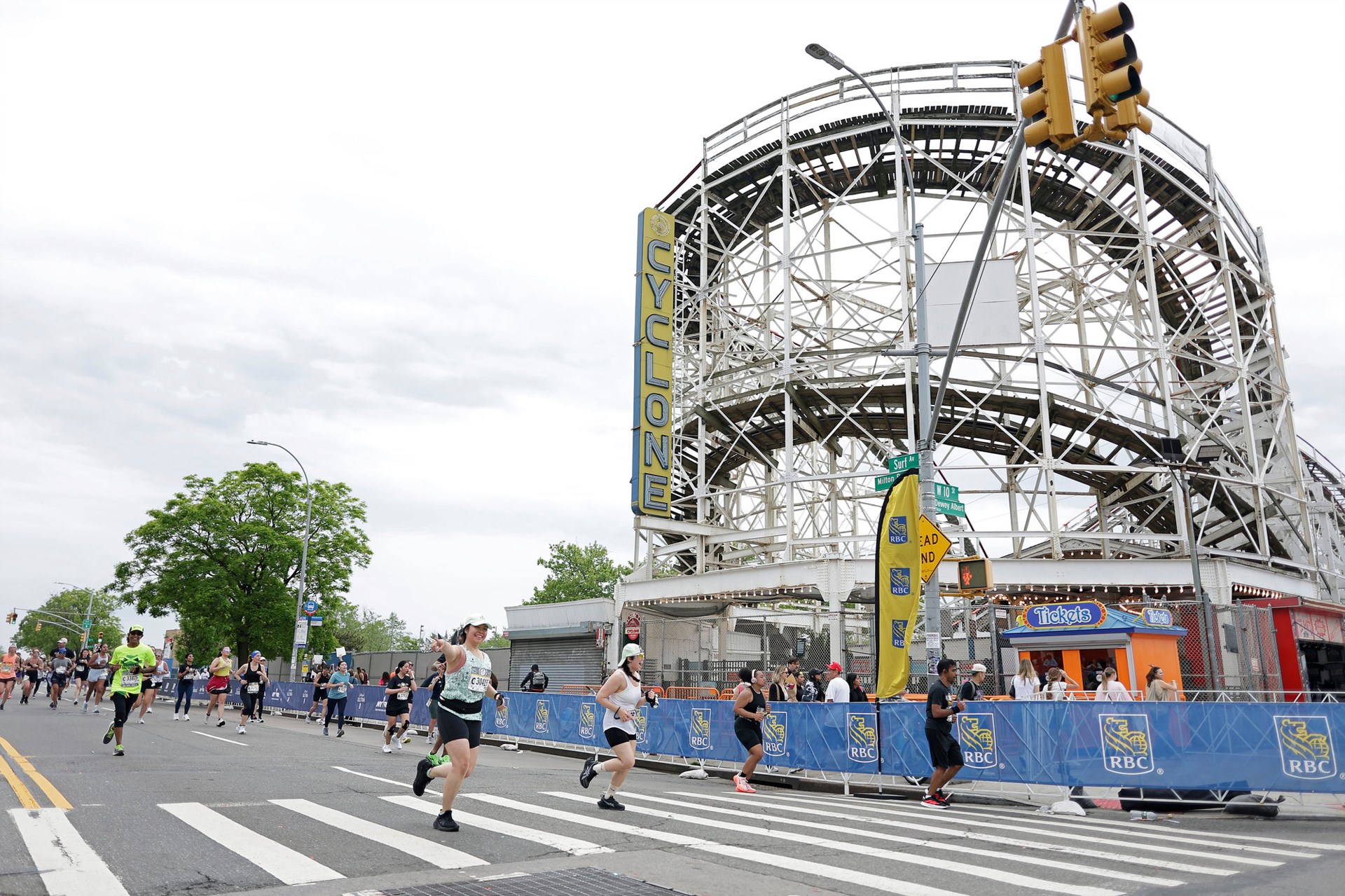 Runners run past the cyclone at the RBC Brooklyn Half