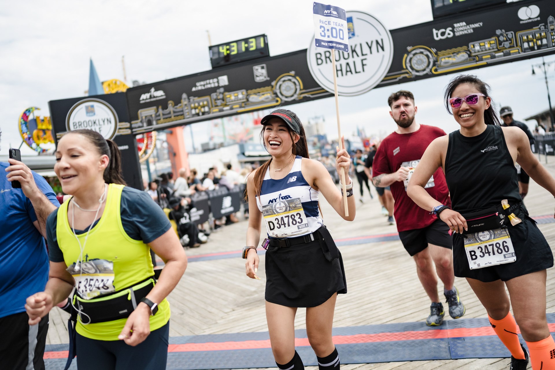 Nearly 28,500 finishers crossing the 2025 RBC Brooklyn Half