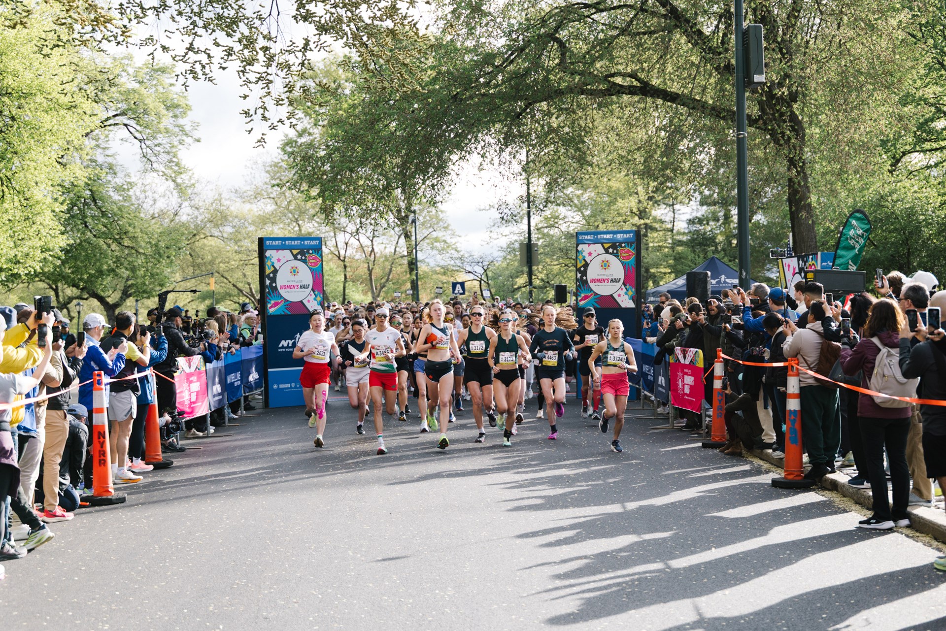 Runners at the Maybelline Women's Half start line