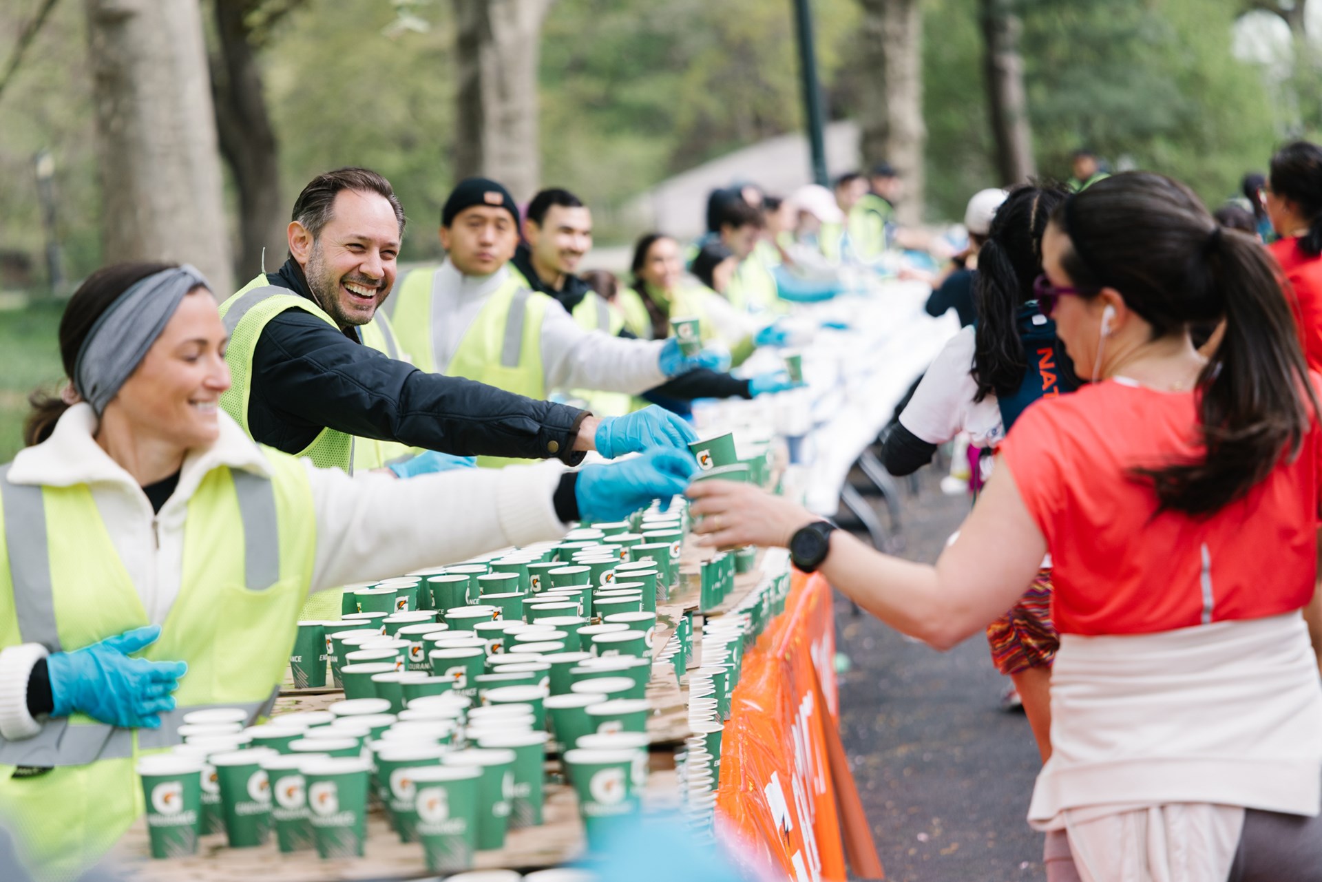 Runners cross the finish line at the Maybelline Women's Half in Central Park