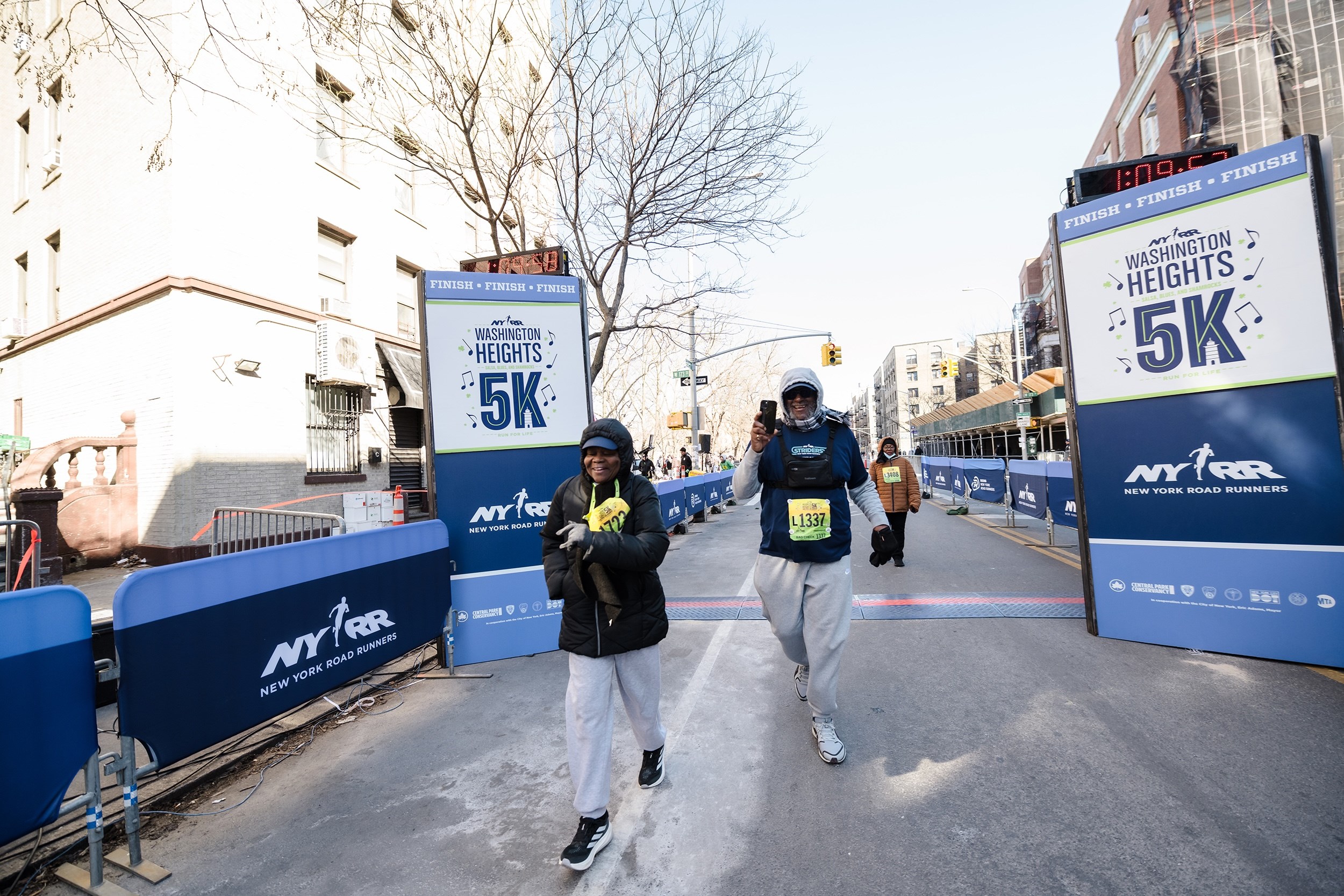 Striders crossing the finish line