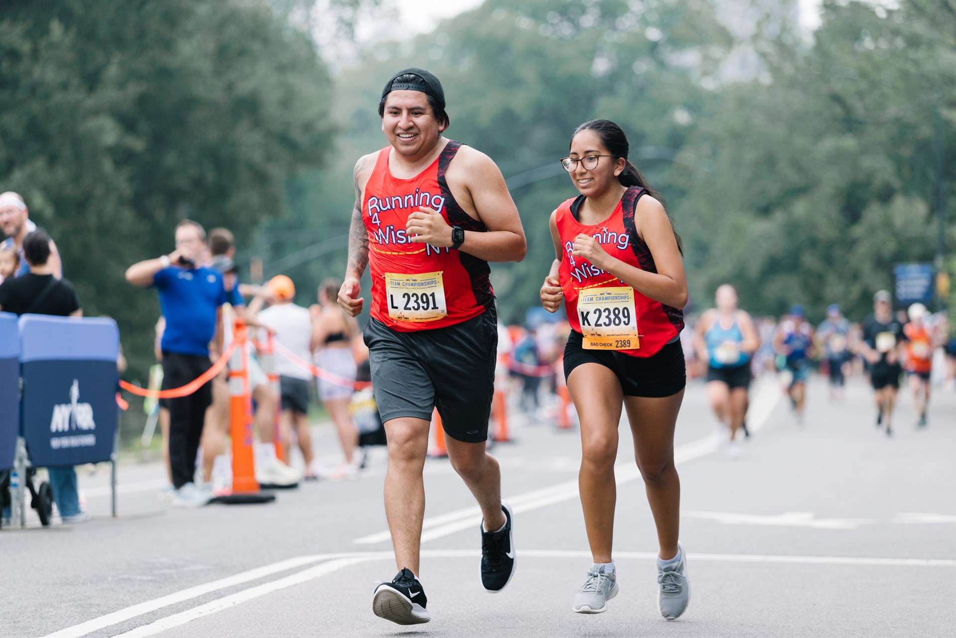 Close up of 2 runners smiling