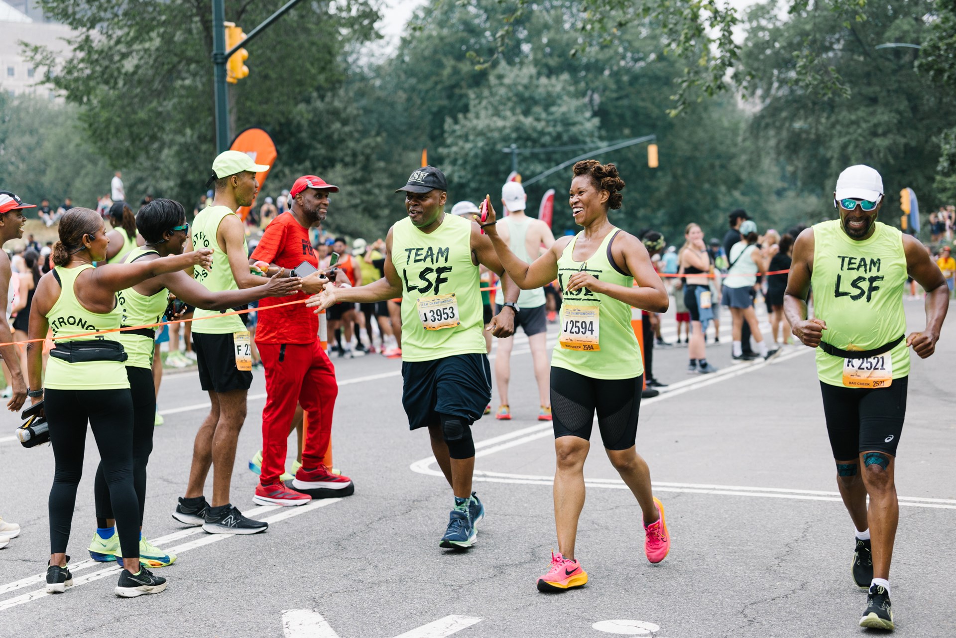 Team Champs participants high-fiving