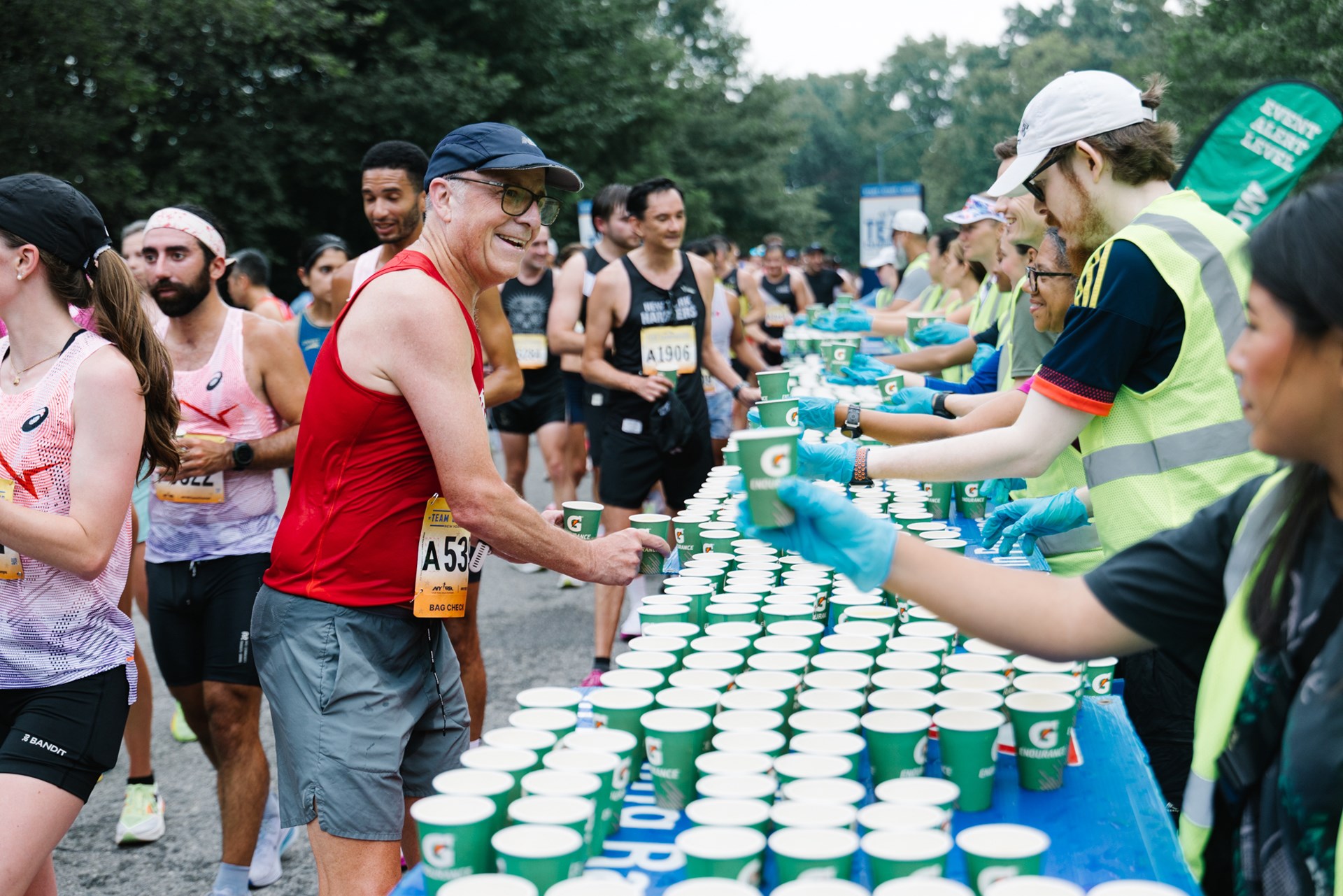 Team Champs participant grabbing water