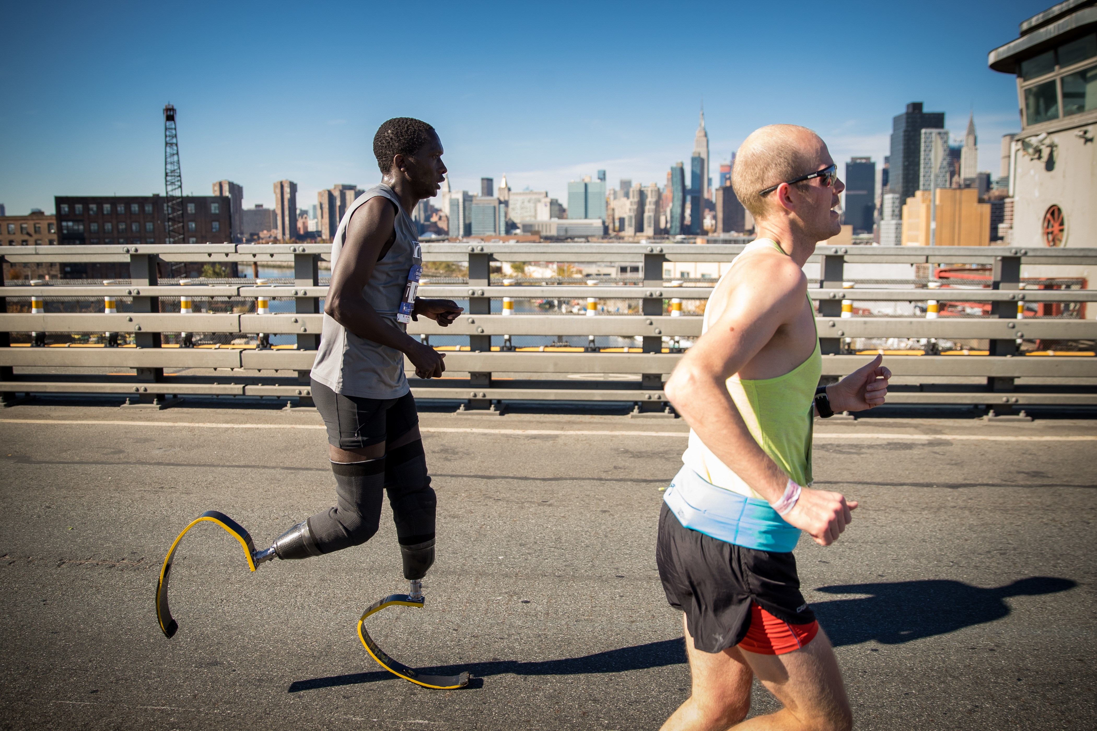 Male runner runs the TCS New York City Marathon with prosthetic legs