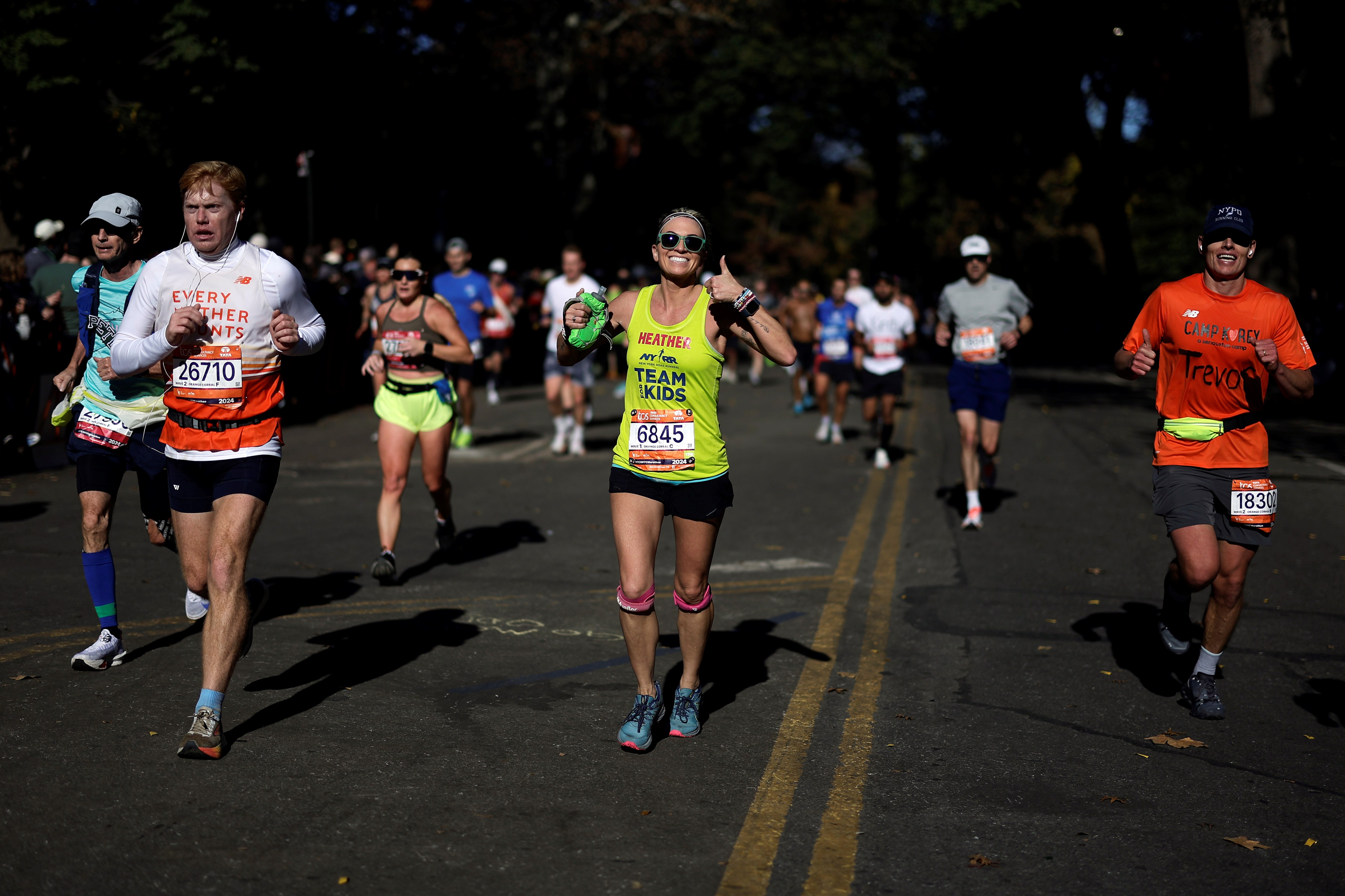 Team for Kids runner and other runners at the 2024 TCS New York City Marathon