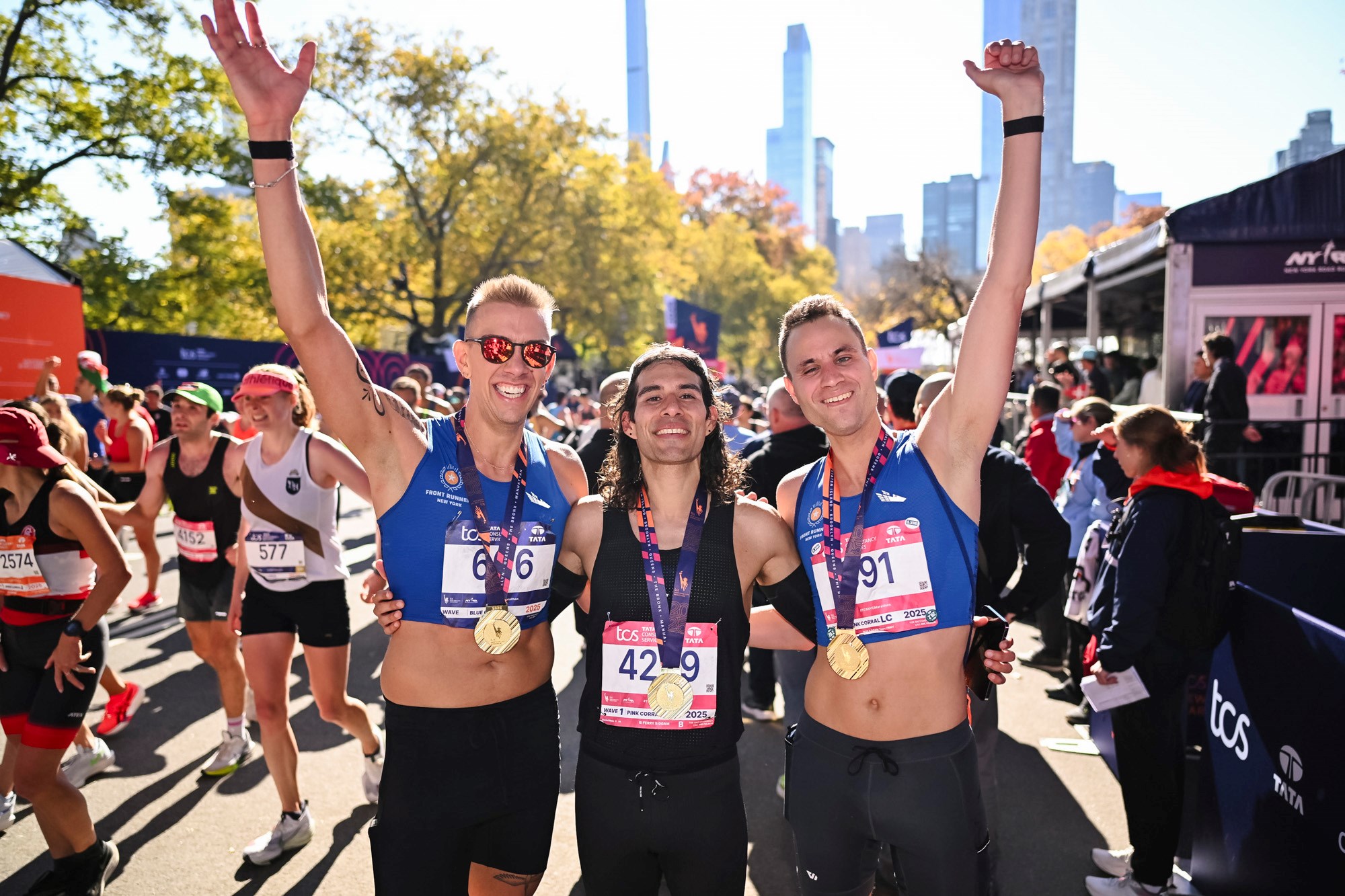 J Solle, Jacob Caswell, and Daniel Mata at the TCS New York City Marathon finish area