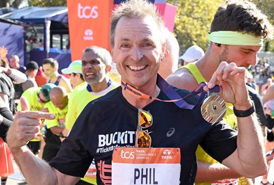Amazing Race Host Phil Keoghan at the TCS New York City Marathon finish area. 