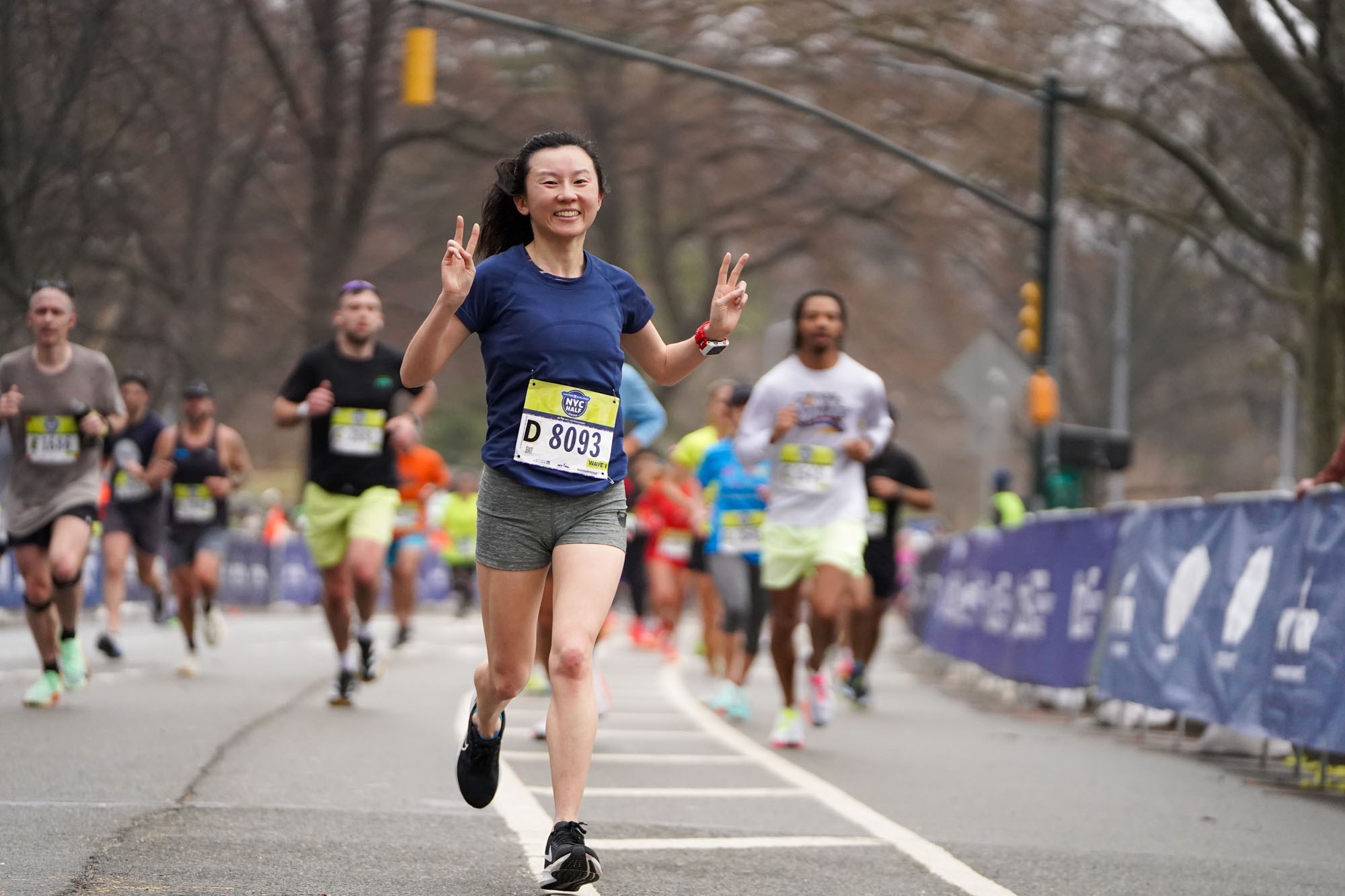 2025 United Airlines NYC Half finisher smiling