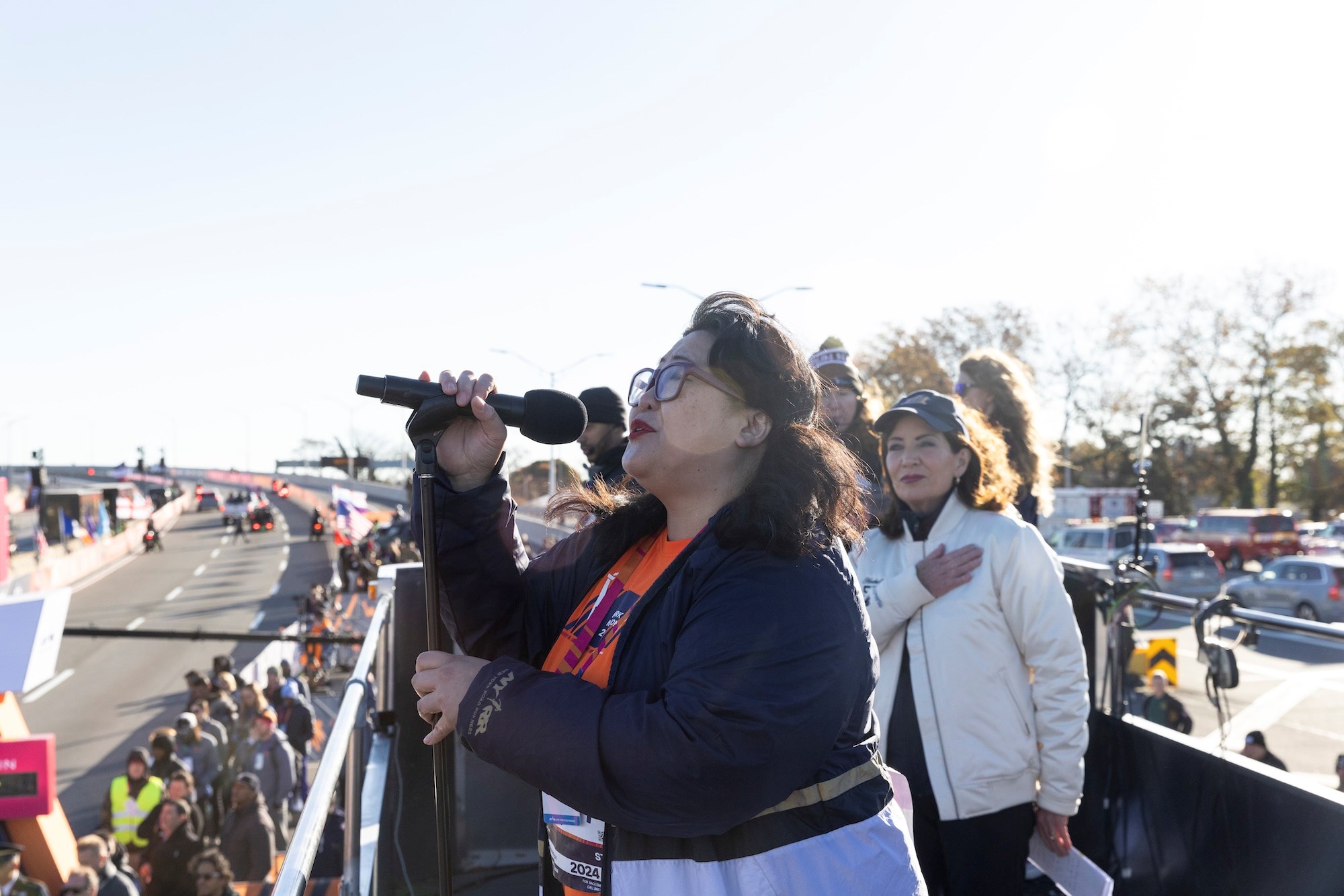 Teresa Hui singing the national anthem at the TCS New York City Marathon start. 