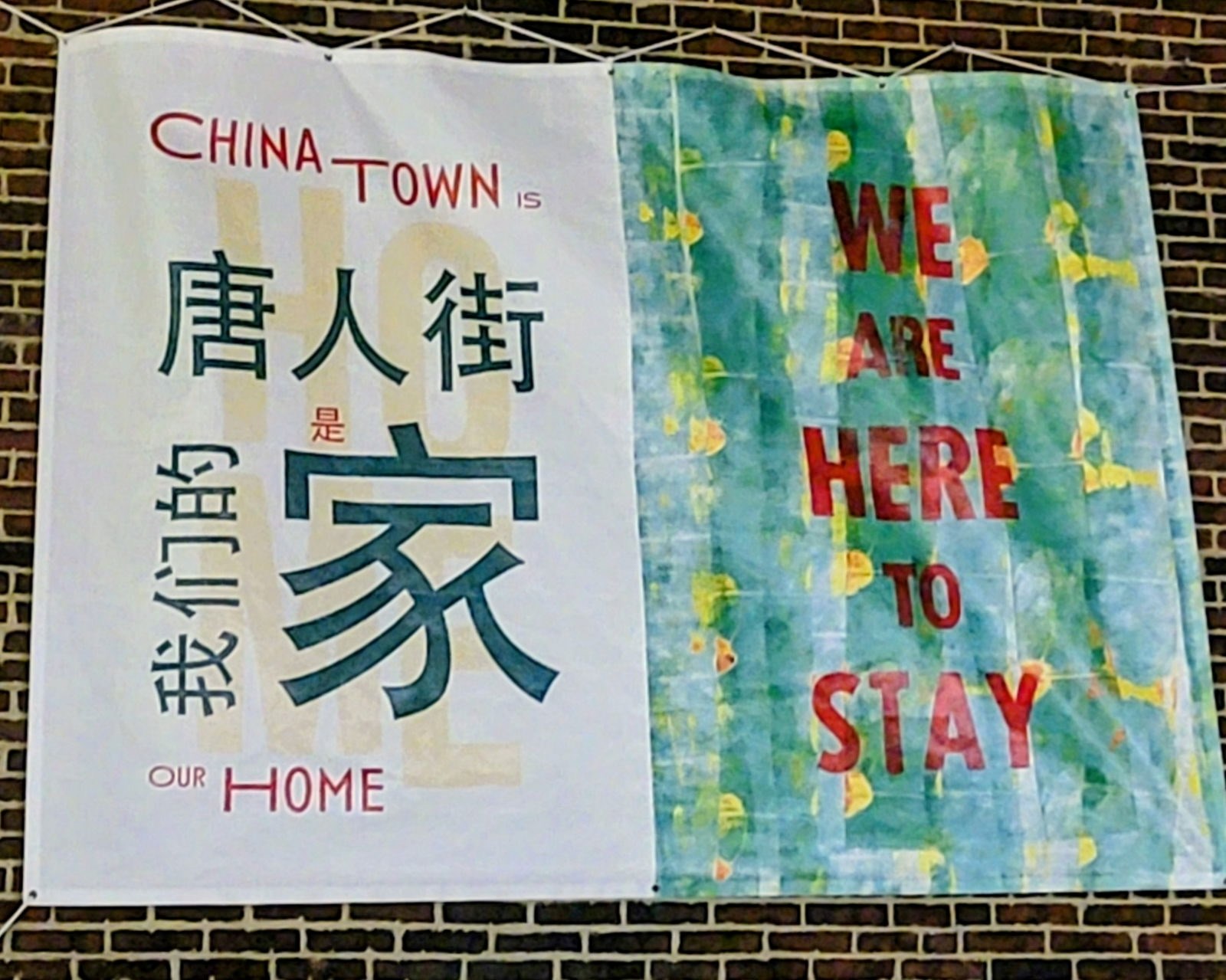 We Are Here to Stay sign