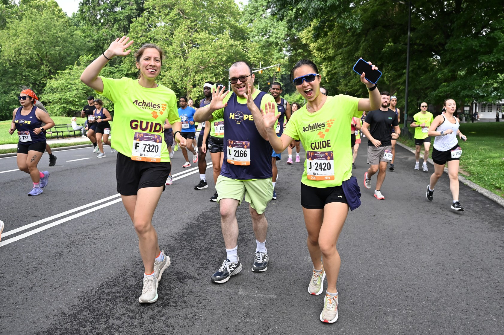 Three runners at 2026 Achilles Hope & Possibility 4M in Central Park June 2026.