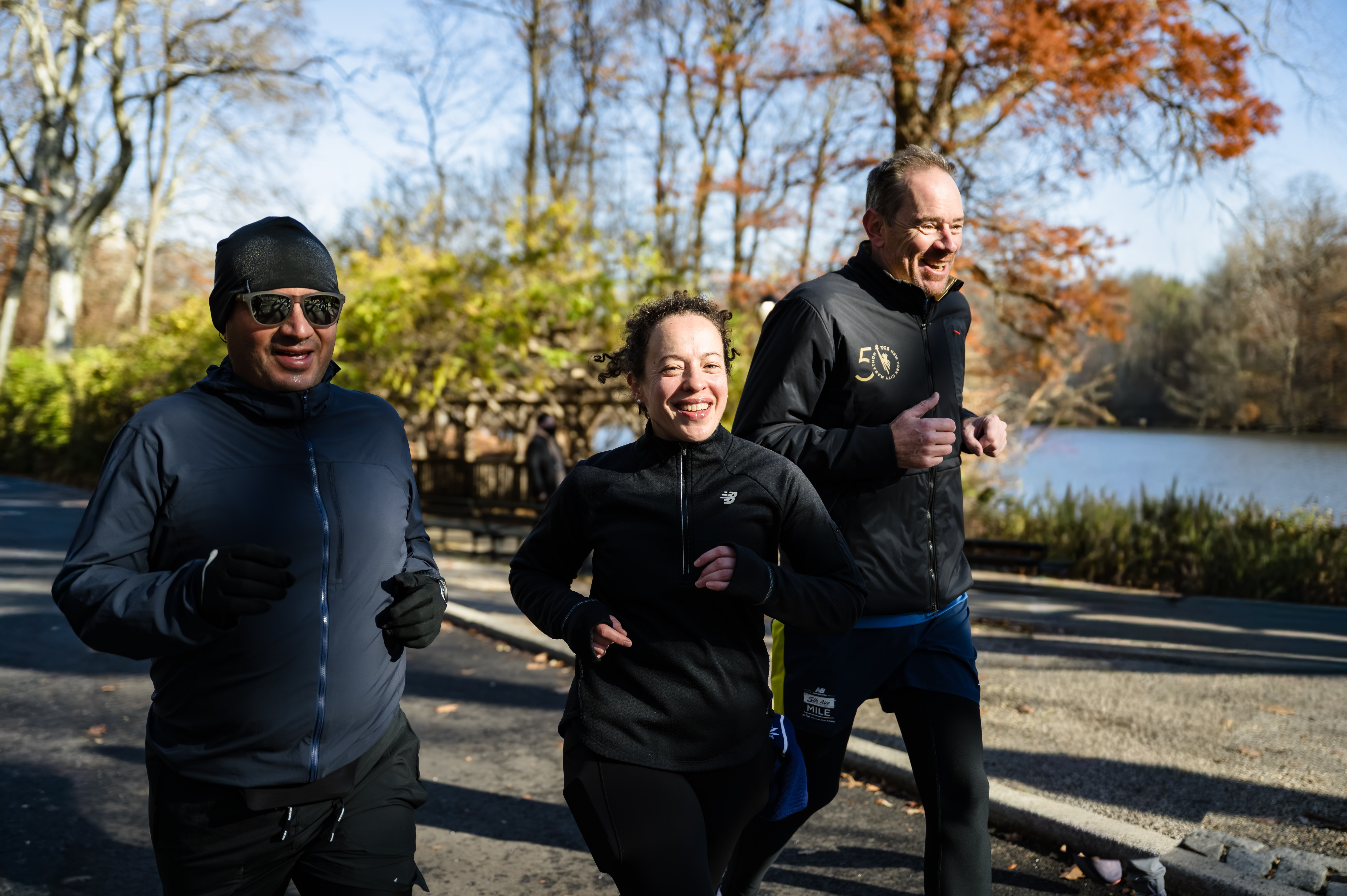 Three runners on West Drive in Central Park in winter 2025