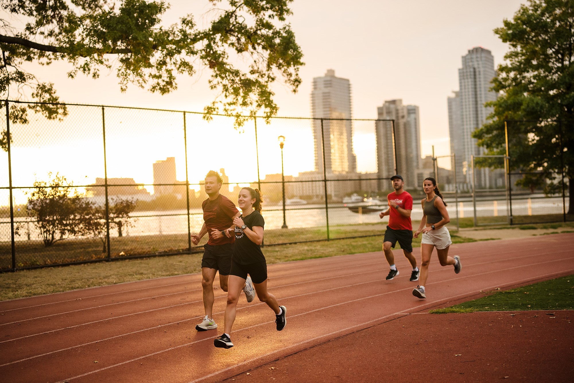 NYRR Group Training runners East River Park track summer 2024