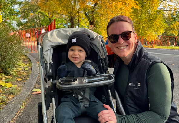 Pam Geisel after the Abbott Dash 2025 with her son in stroller