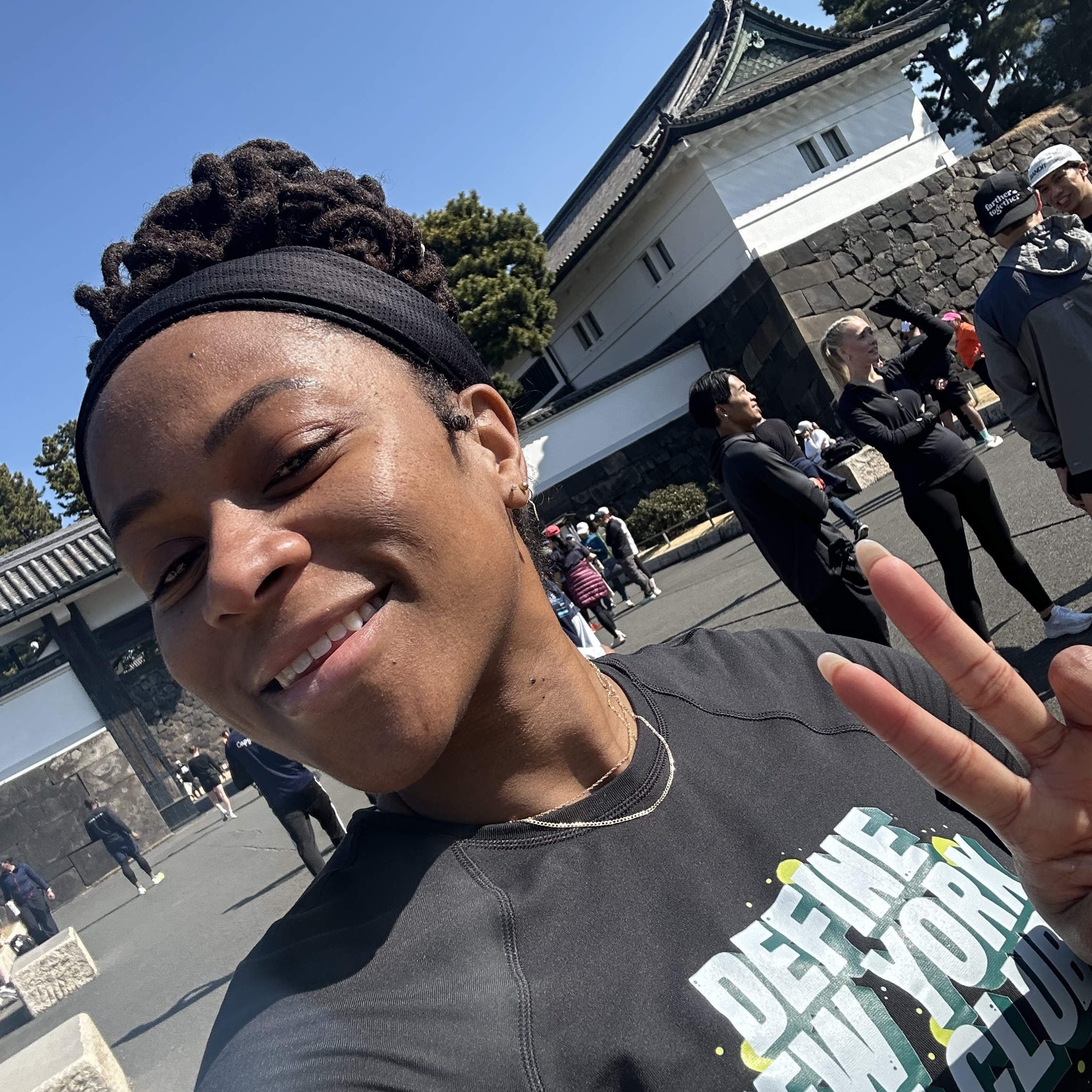 Victoria Fortune in front of temple in Japan in 2025.