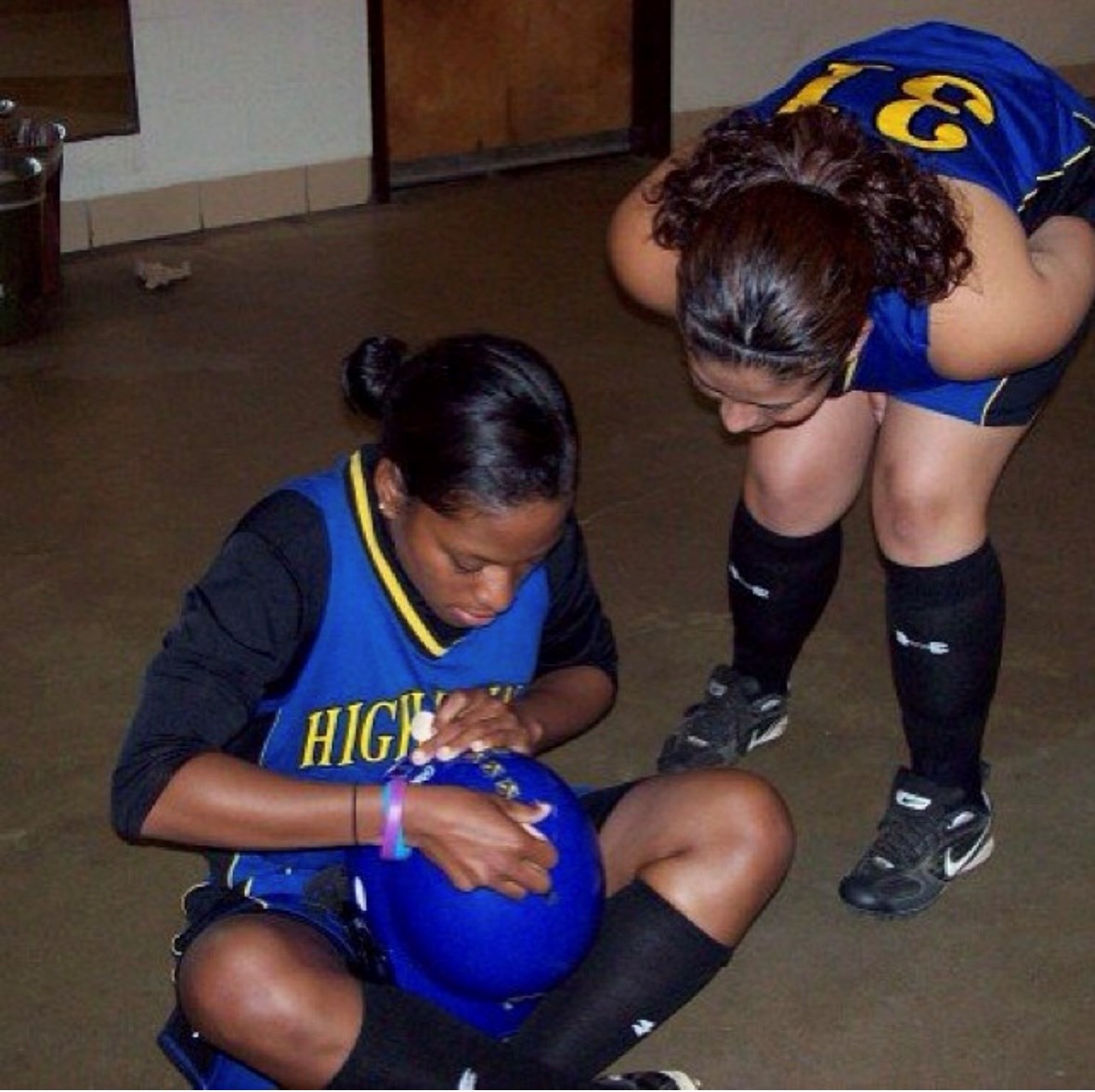 Victoria Fortune and basketball teammate in childhood.